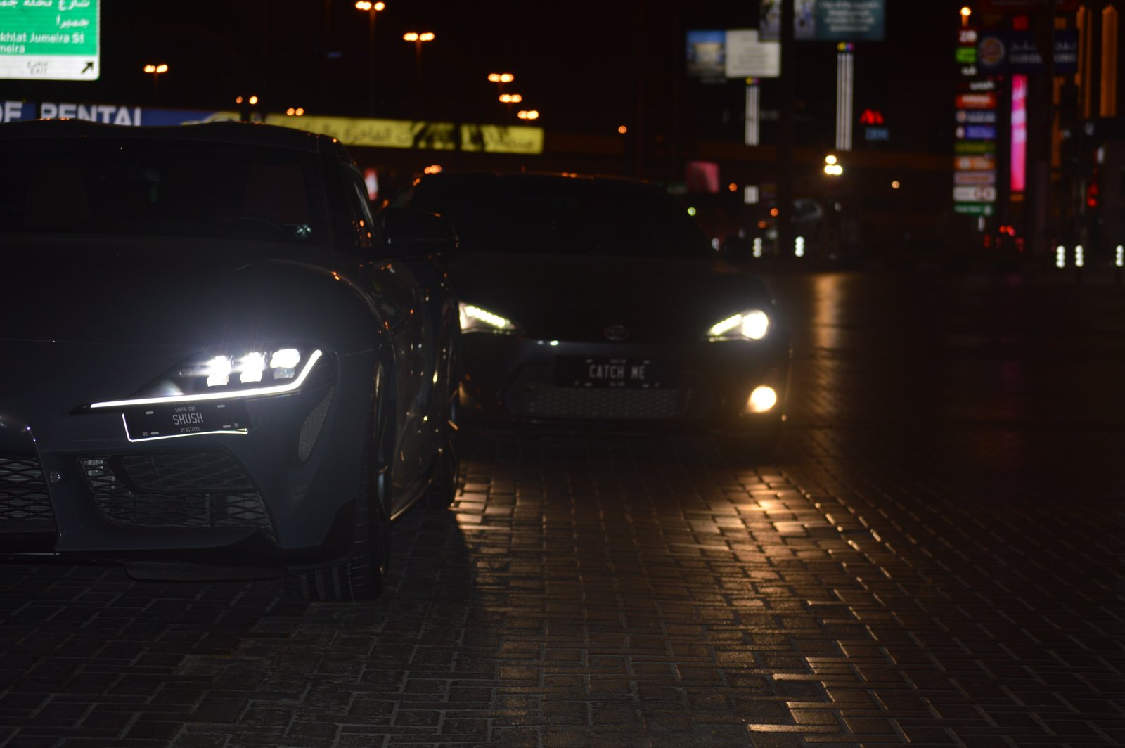 SHUSH plate at night street scene